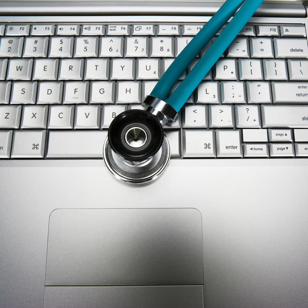 Laptop and Stethoscope --- Image by © Royalty-Free/Corbis