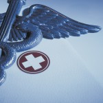 Caduceus with First-aid Kit --- Image by © Royalty-Free/Corbis